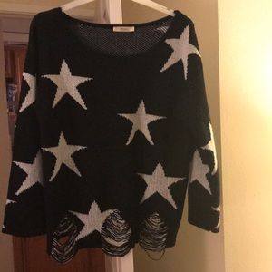 Distressed star sweater